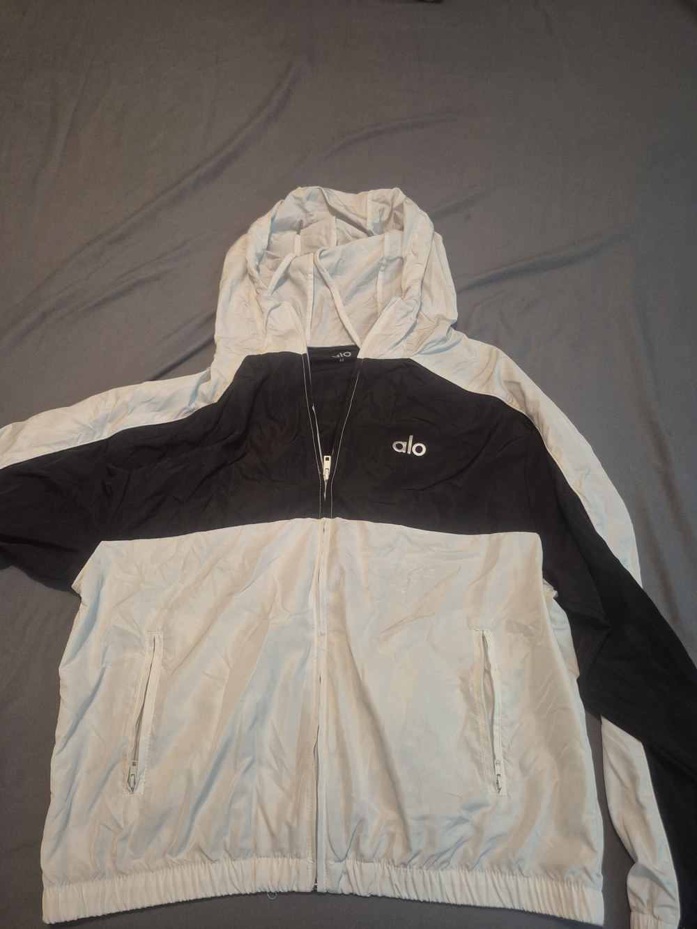 ALO Yoga Men’s Black and White Colorblock Hooded Windbreaker